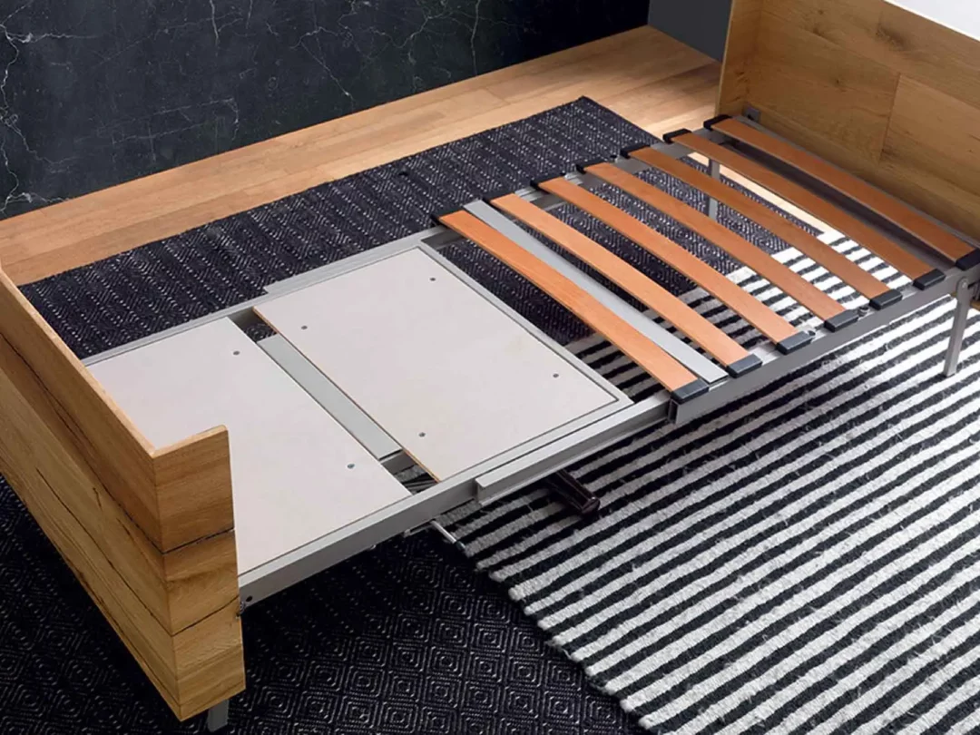 Table transformable en lit d'appoint